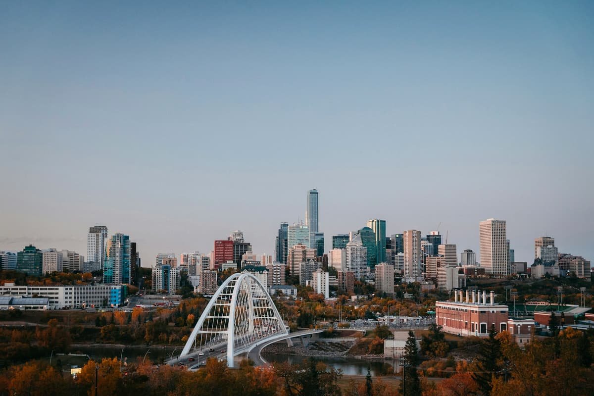 A city skyline with a bridge in the foreground in Edmonton skyline above the North Saskatchewan River valley, Alberta