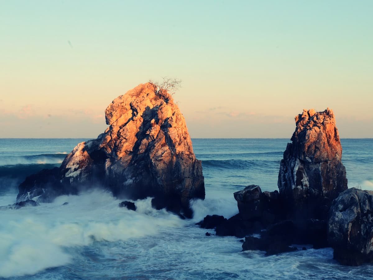 A large rock sticking out of the ocean: date idea in New Brunswick