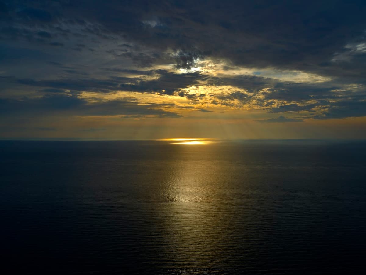 Sunset over a calm ocean: date idea in Nova Scotia