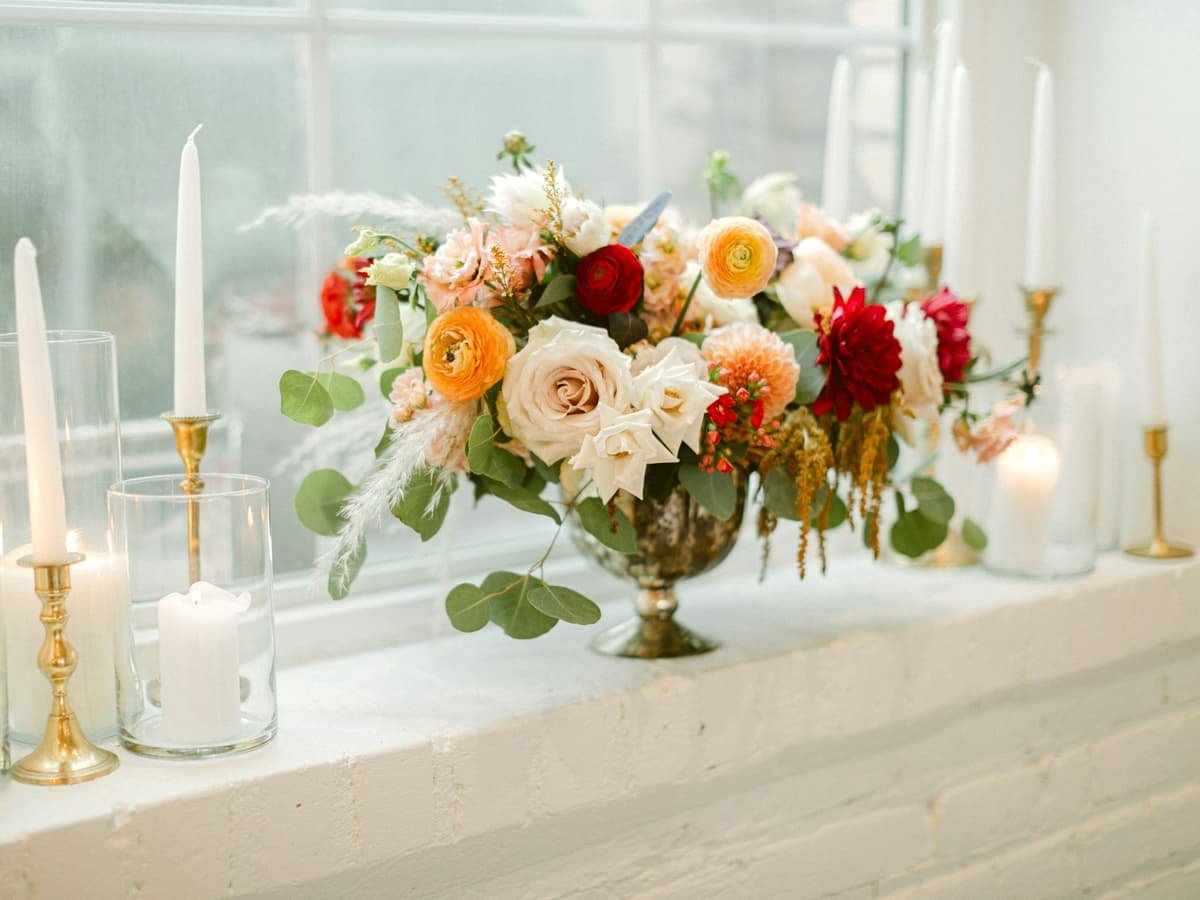 A flowers with candles on a windowsill: date idea in Nova Scotia