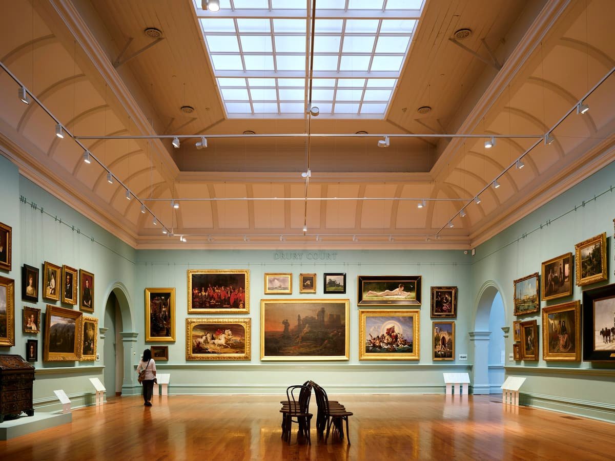 A room filled with lots of paintings and a skylight: date idea in Nunavut