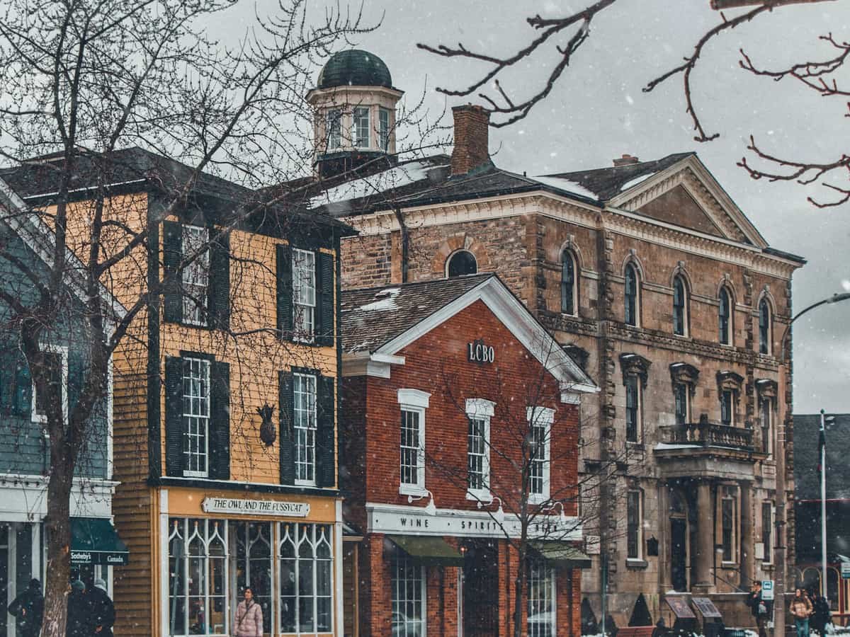 A row of buildings on a snowy day: date idea in Ontario