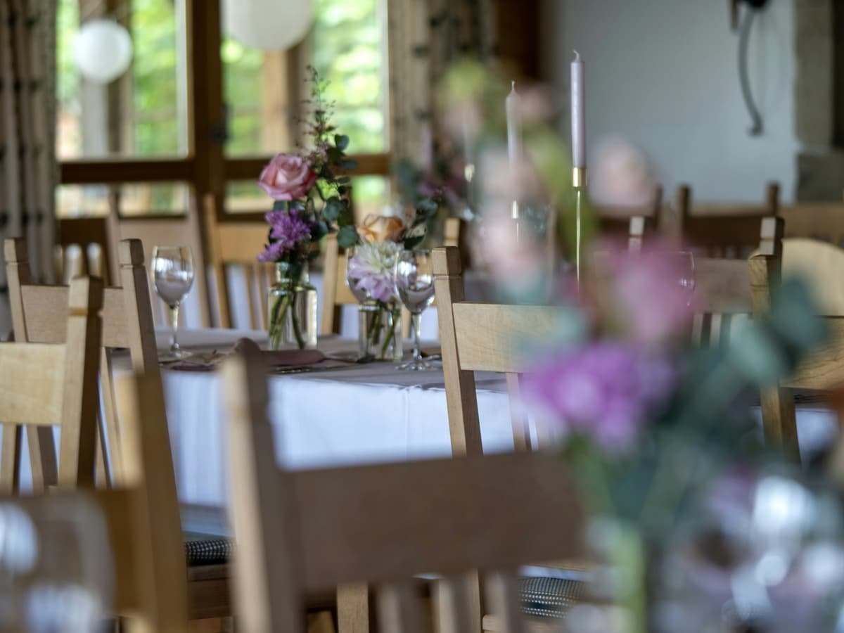 A dining room filled with lots of tables and chairs: date idea in Ontario