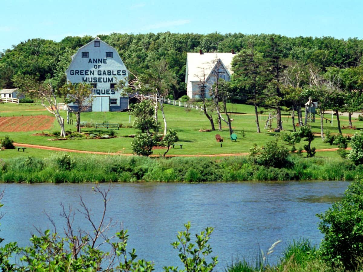Green grass field near body of water during daytime: date idea on Prince Edward Island
