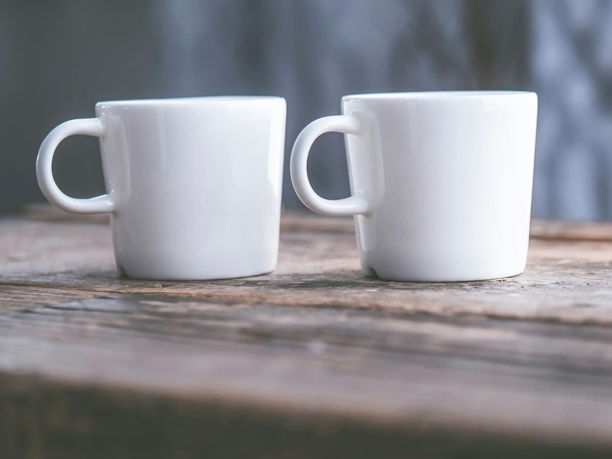 Two white teacups: date idea on Prince Edward Island